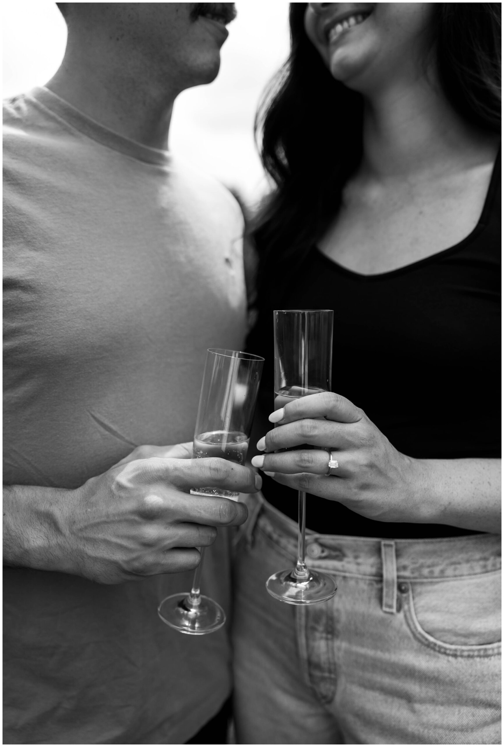 champagne toast engagement photos
