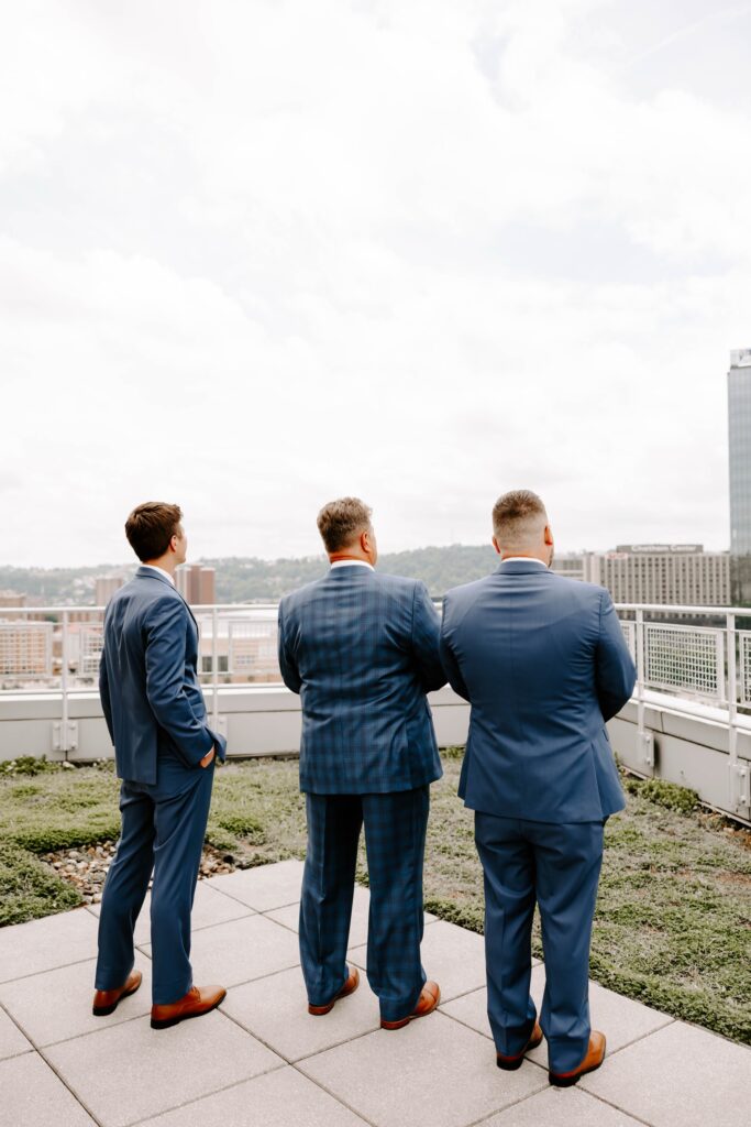 wedding first look with dad and brothers