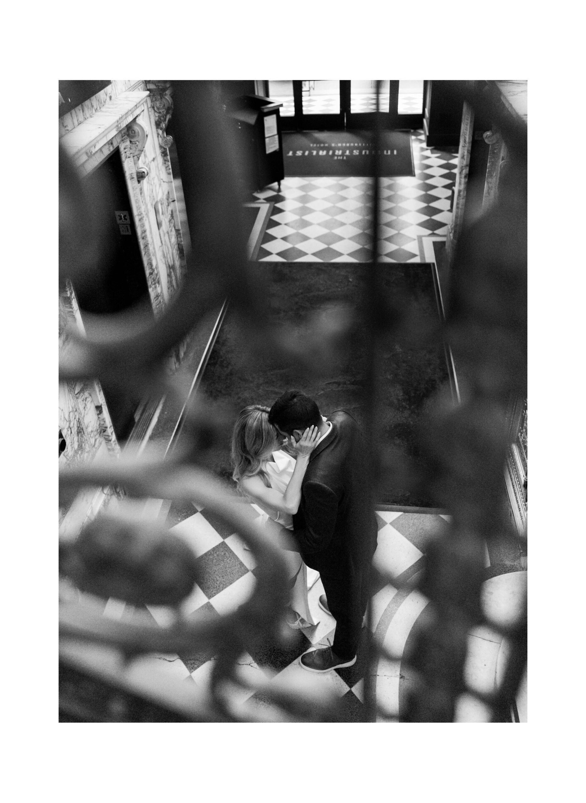 Romantic black and white engagement portrait indoors