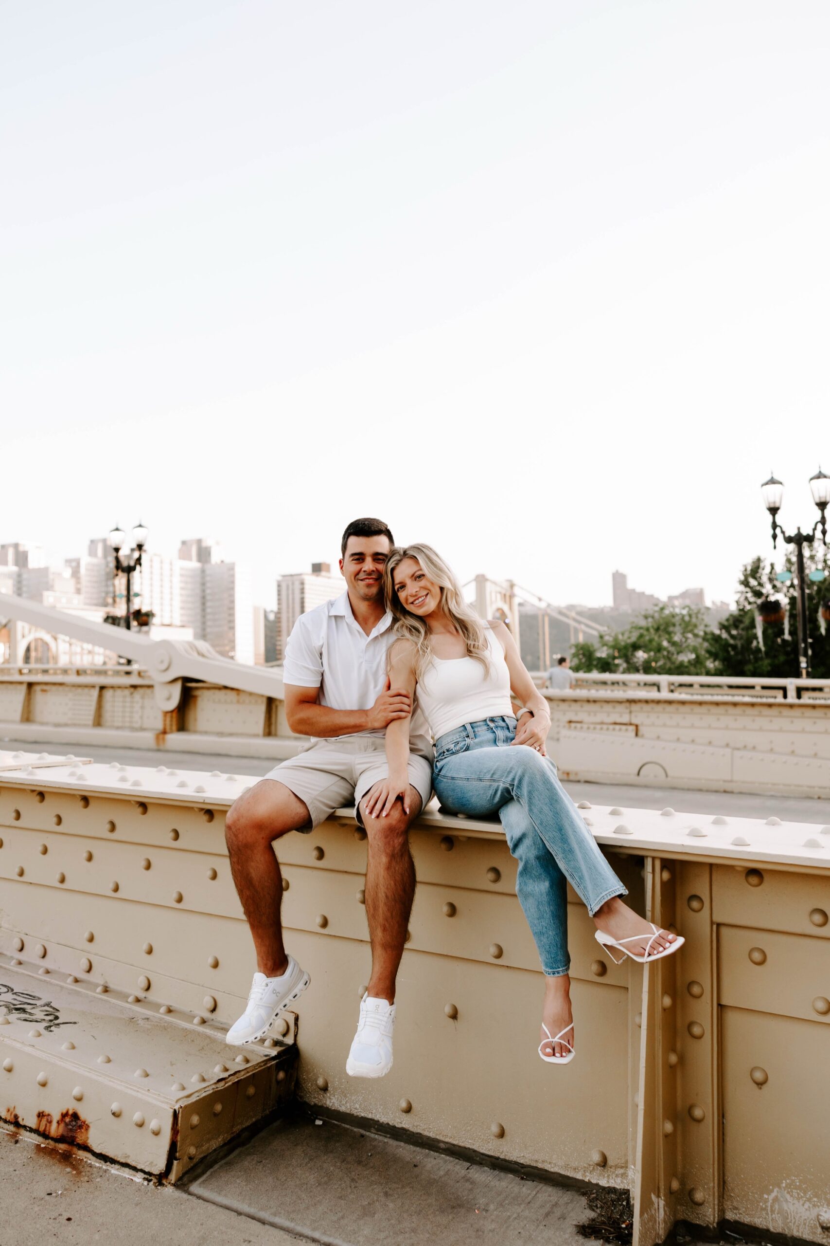 Couple dancing on Pittsburgh’s iconic yellow bridge during engagement session