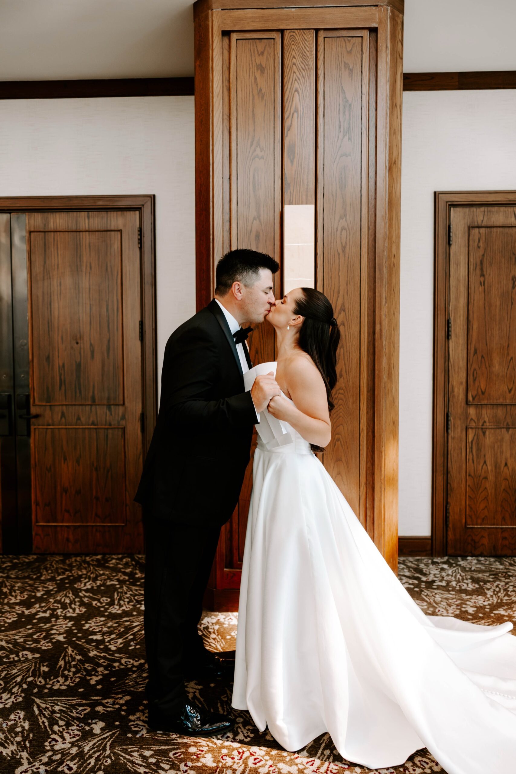 wedding first look on balcony; modern classic wedding; vow exchange photography