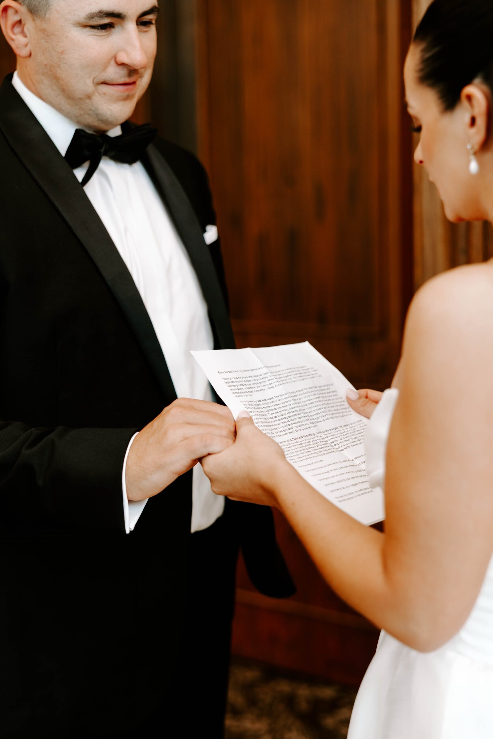 wedding first look on balcony; modern classic wedding; vow exchange photography