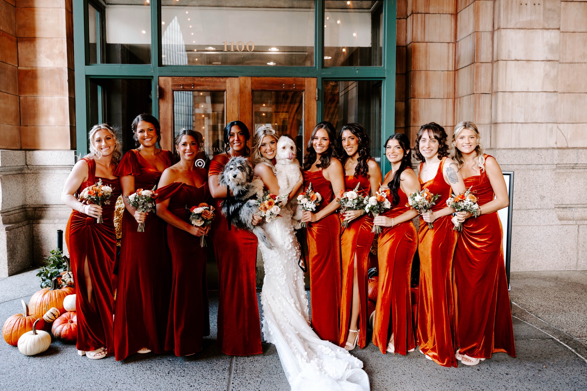 creative wedding party photo ideas; fall bridesmaids dresses; red velvet bridesmaids dresses