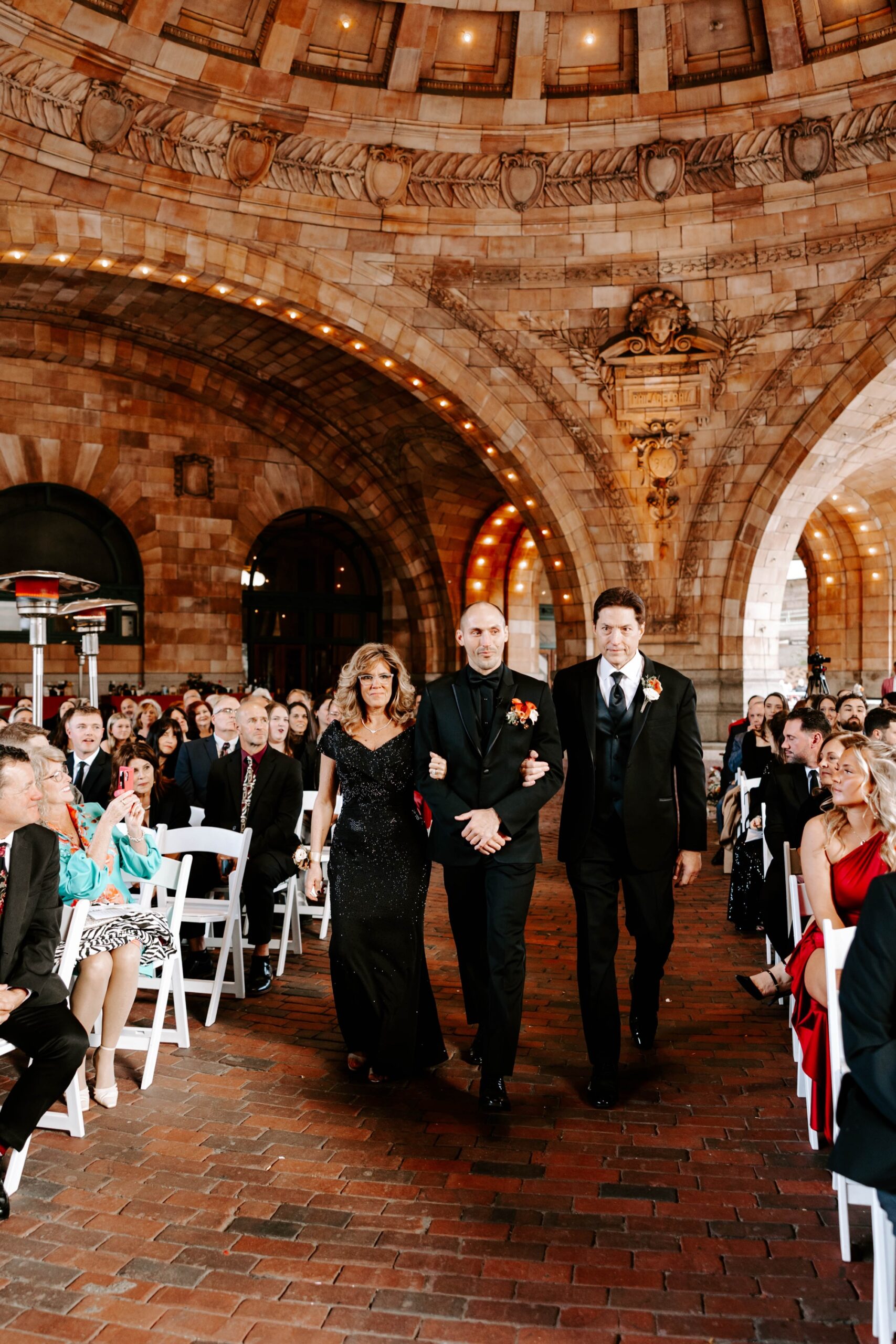 outdoor fall wedding ceremony beneath the dome at the Pennsylvanian; wedding ceremony at The Rotunda, Pittsburgh