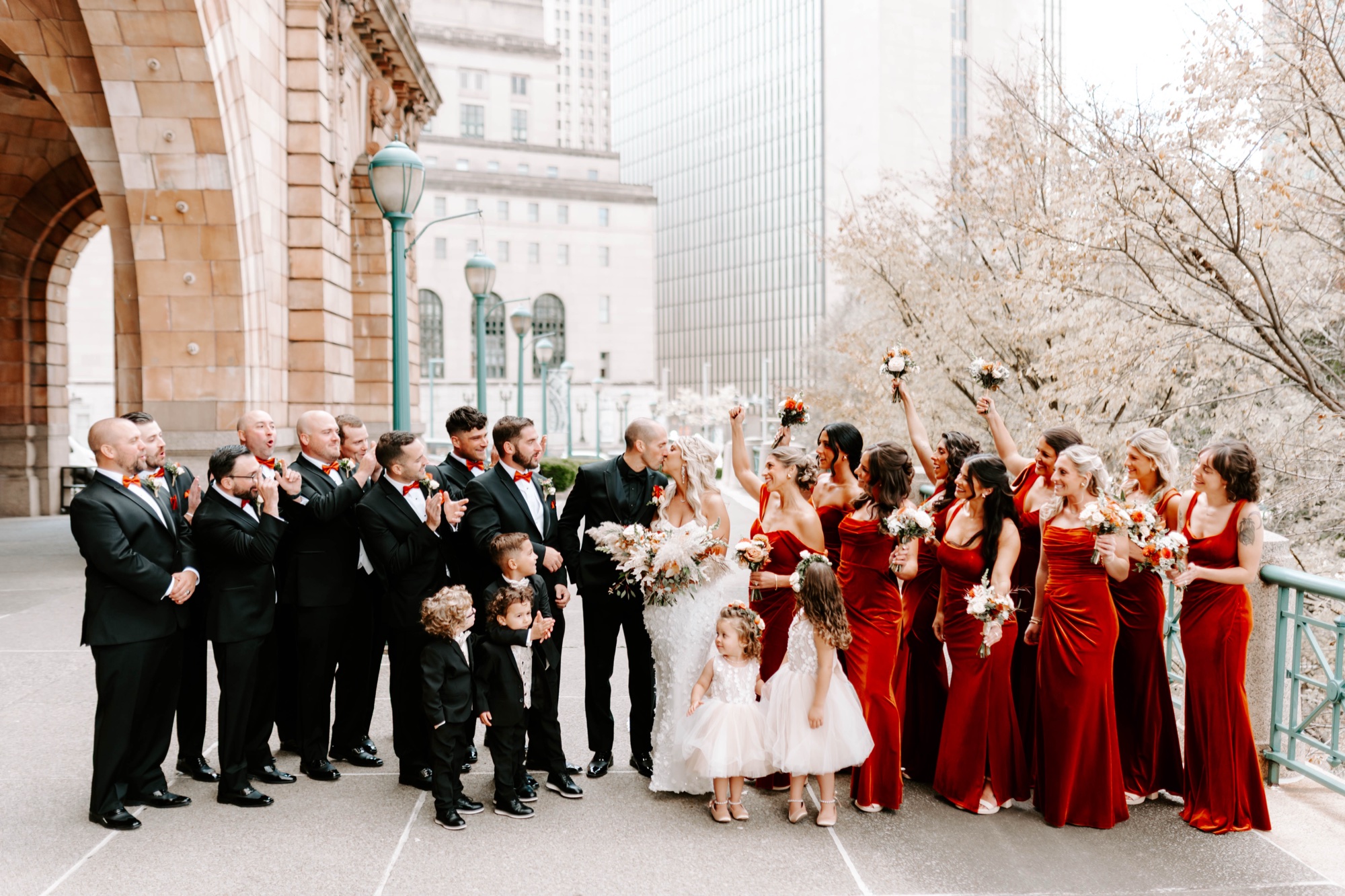 creative wedding party photo ideas; fall bridesmaids dresses; red velvet bridesmaids dresses