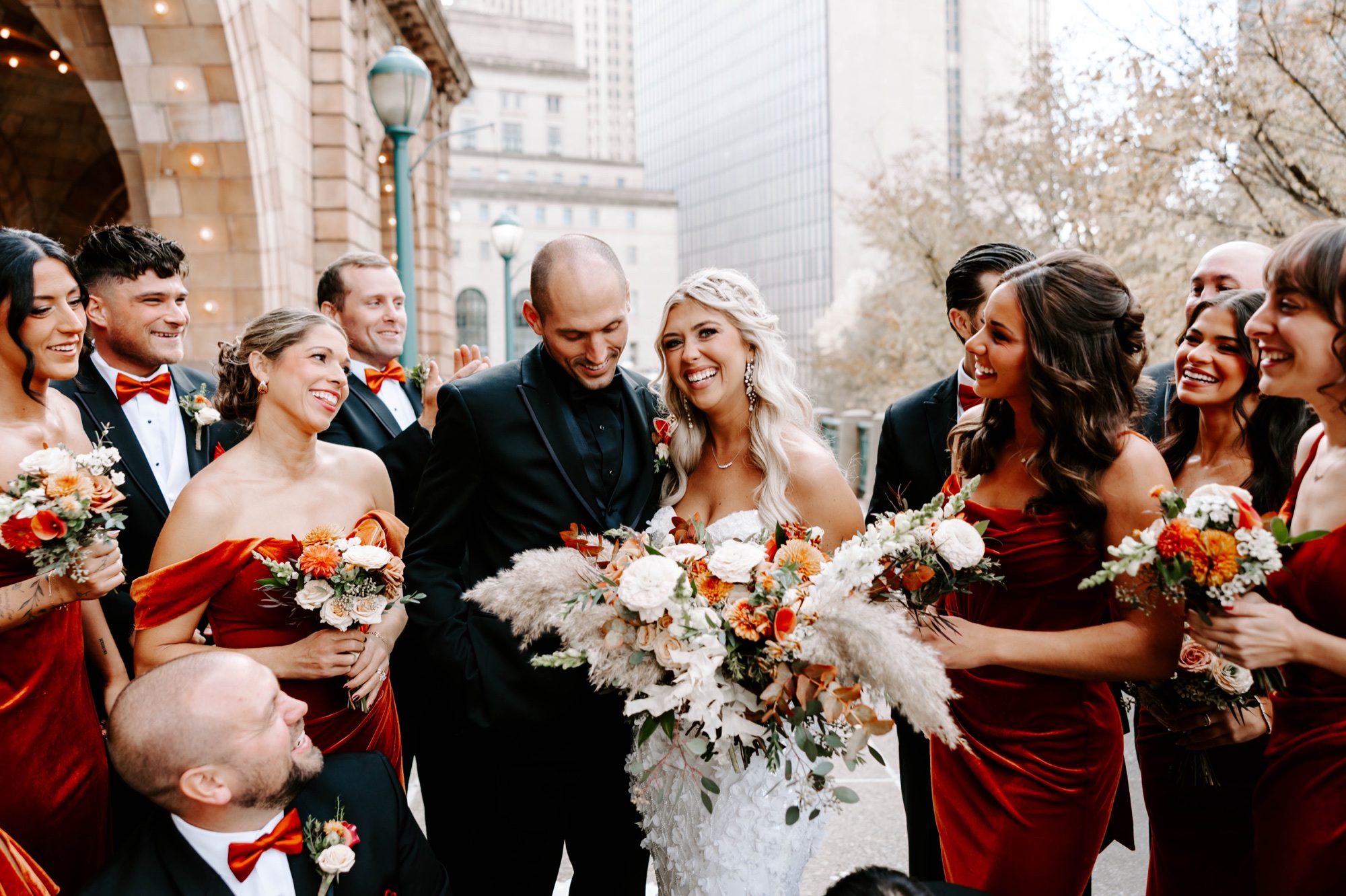 creative wedding party photo ideas; fall bridesmaids dresses; red velvet bridesmaids dresses