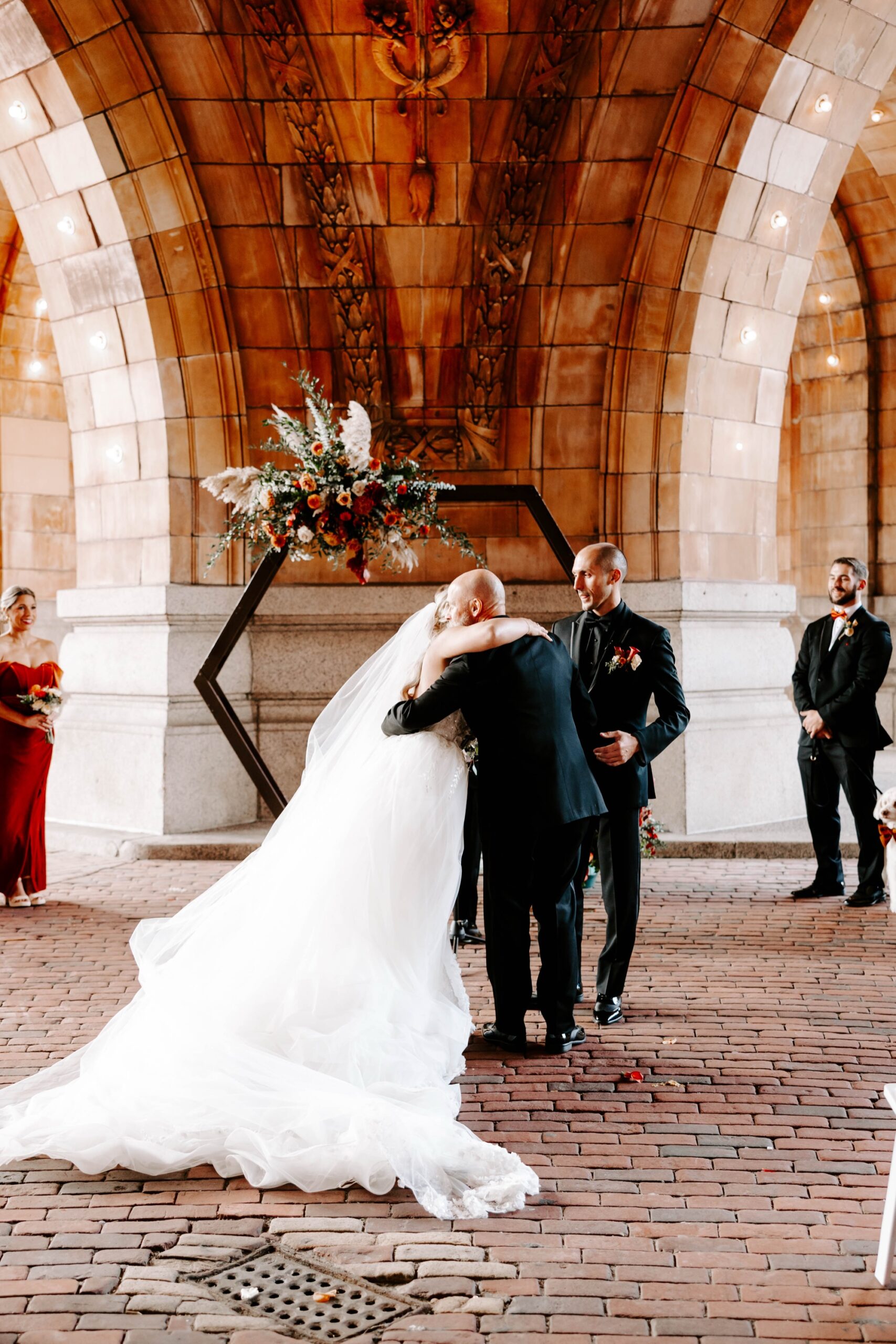 outdoor fall wedding ceremony beneath the dome at the Pennsylvanian; wedding ceremony at The Rotunda, Pittsburgh