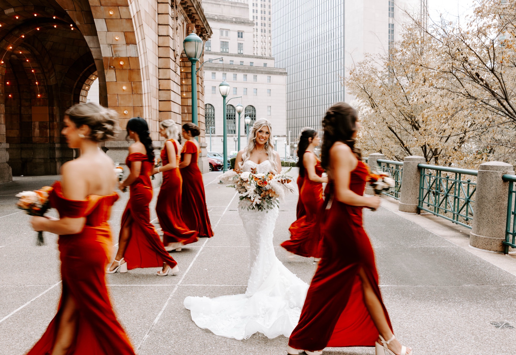 creative wedding party photo ideas; fall bridesmaids dresses; red velvet bridesmaids dresses