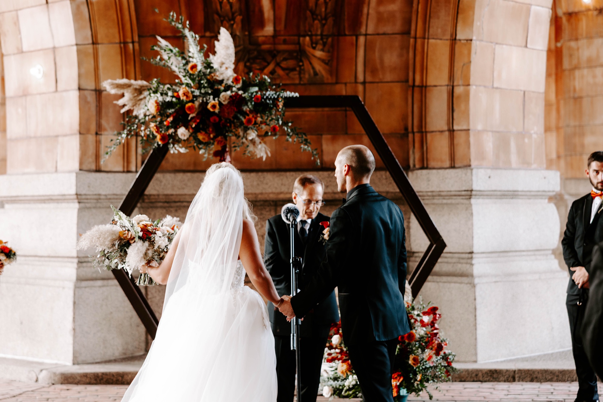 outdoor fall wedding ceremony beneath the dome at the Pennsylvanian; wedding ceremony at The Rotunda, Pittsburgh