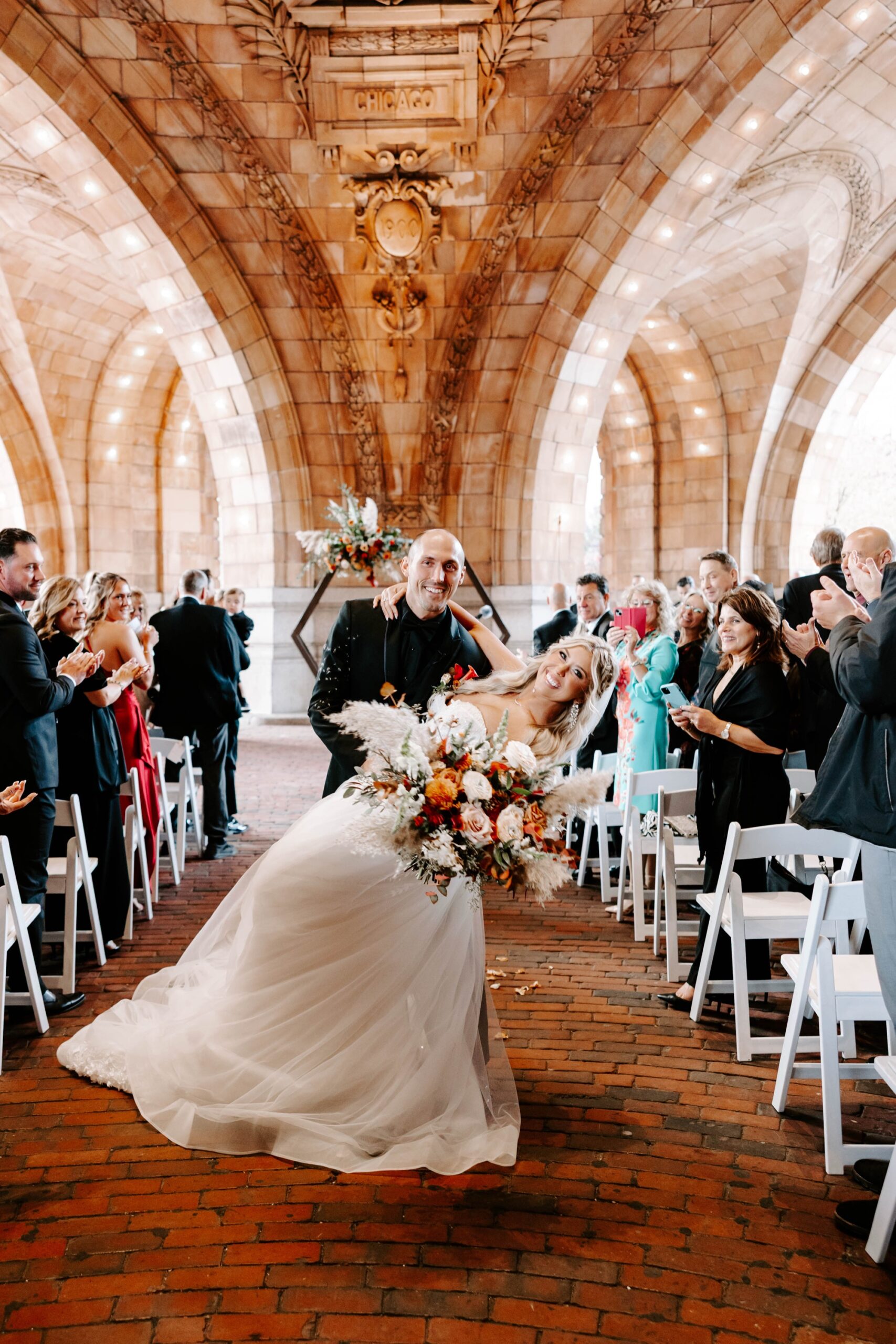 outdoor fall wedding ceremony beneath the dome at the Pennsylvanian; wedding ceremony at The Rotunda, Pittsburgh