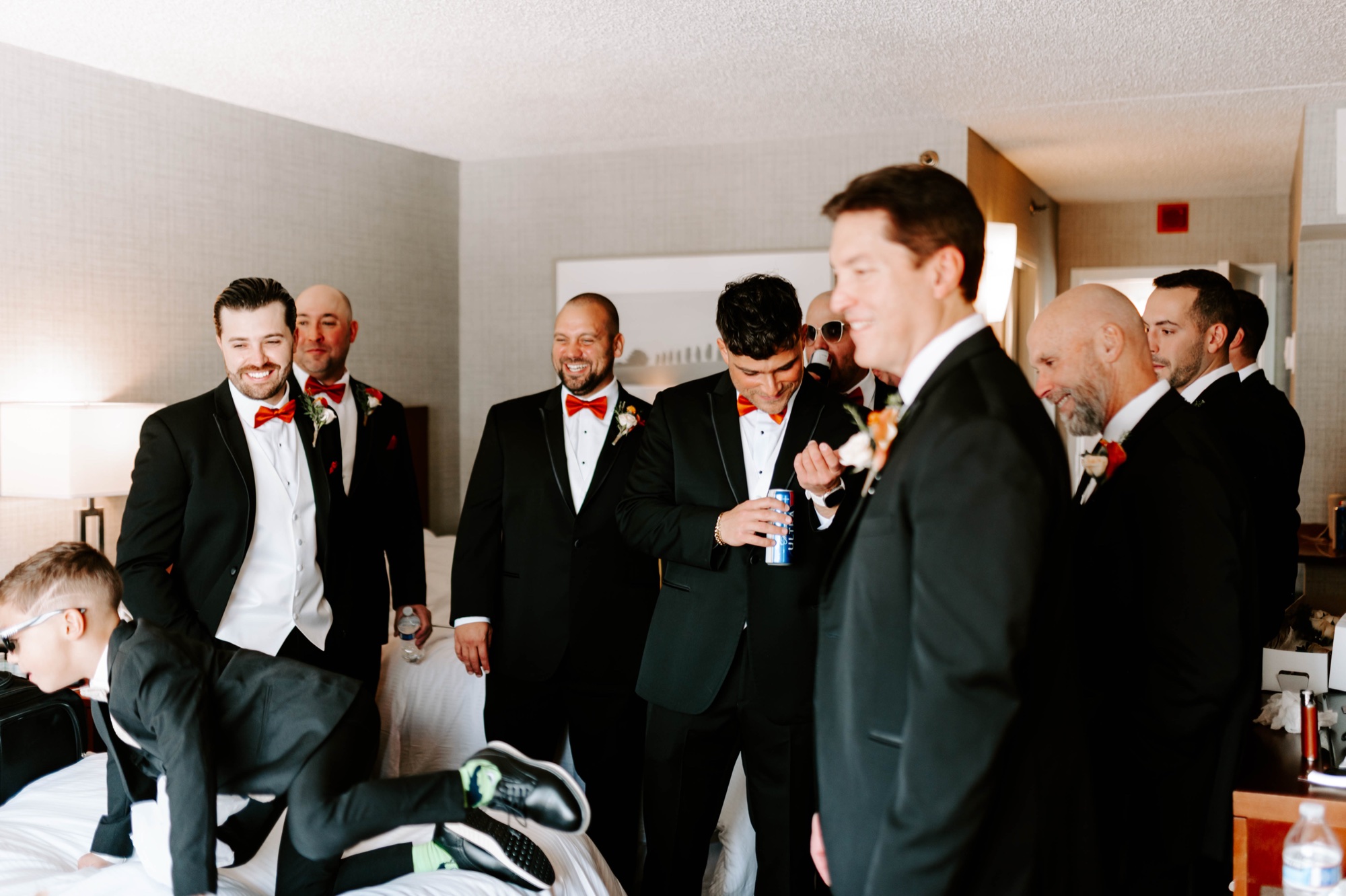 fun and creative groomsmen getting ready photos