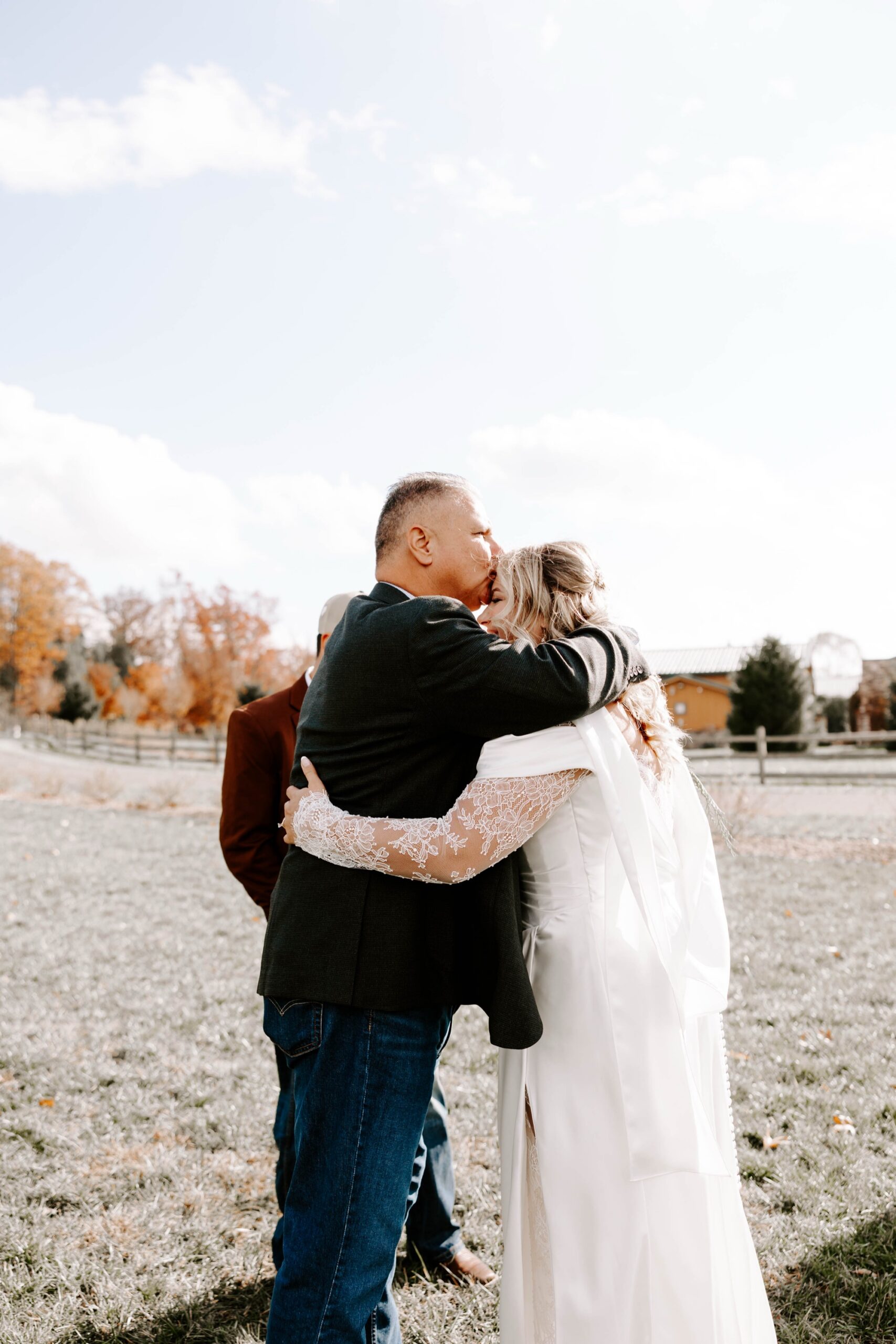 bride's first look with dad and brother