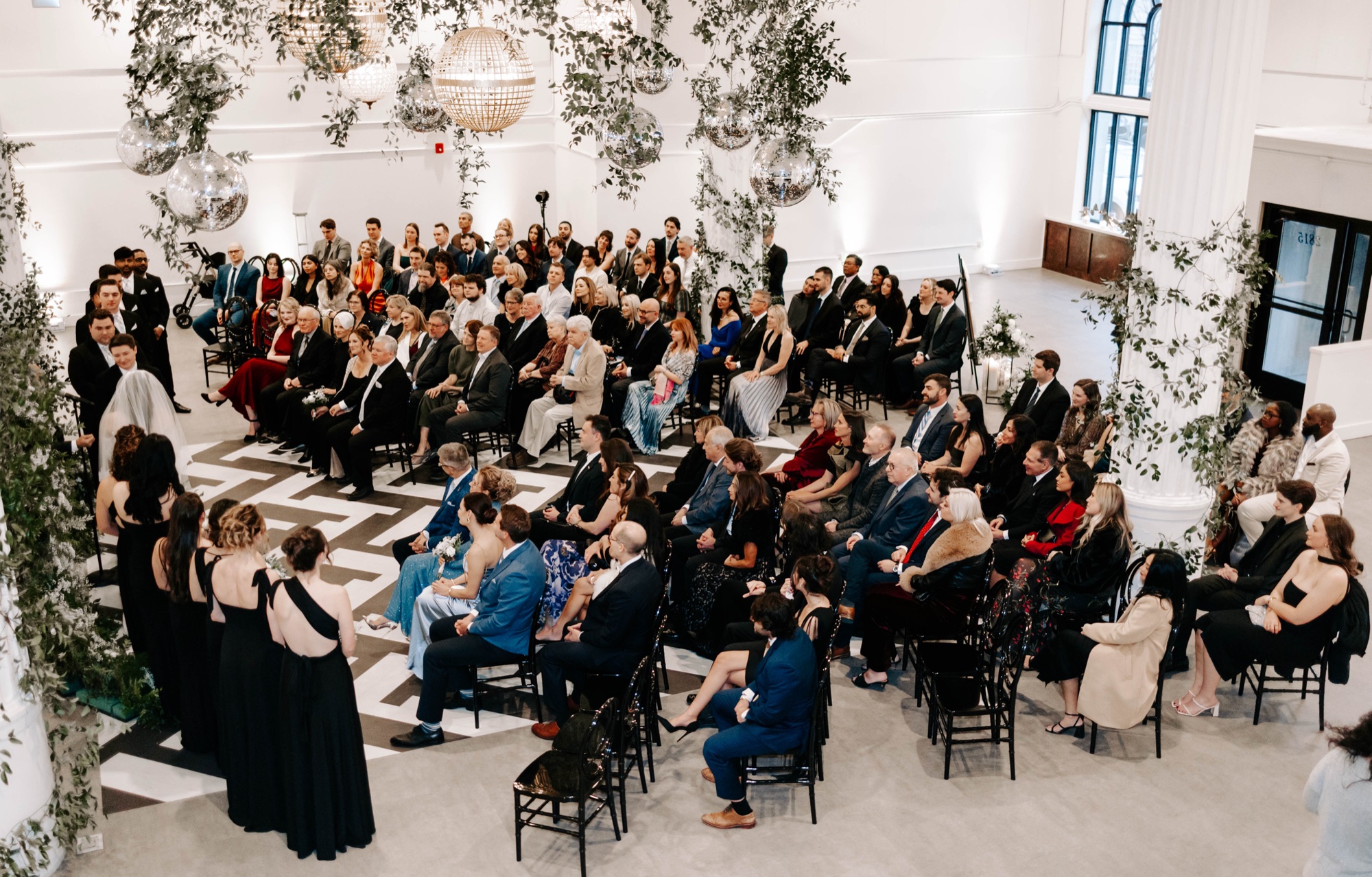 winter wedding at Franklin on Penn Pittsburgh; black and white plus greenery and disco balls