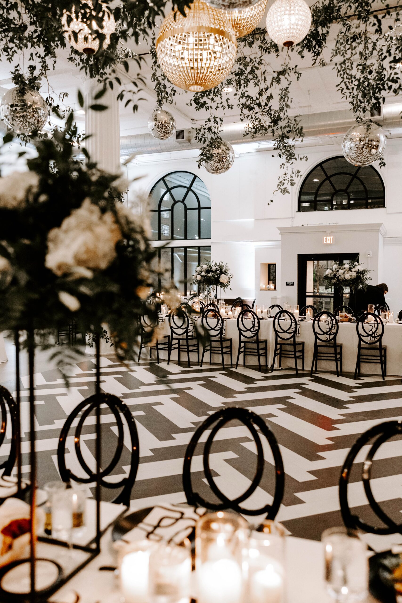 how to style a blank canvas venue; black and white winter wedding with disco balls at Franklin on Penn Pittsburgh wedding venue