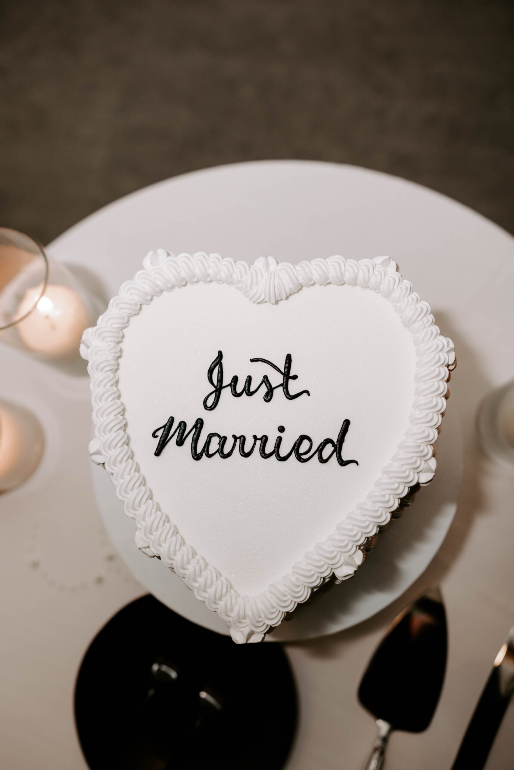 vintage white just married wedding cake