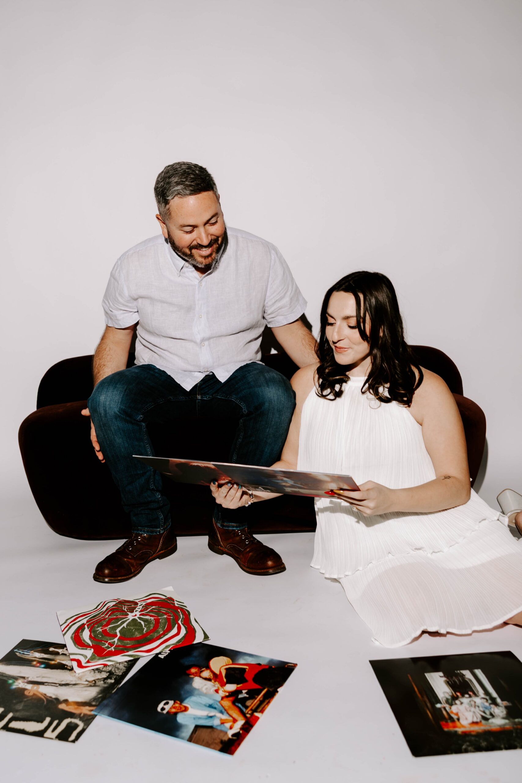 minimalist engagement photos in the studio, white backdrop studio sessions