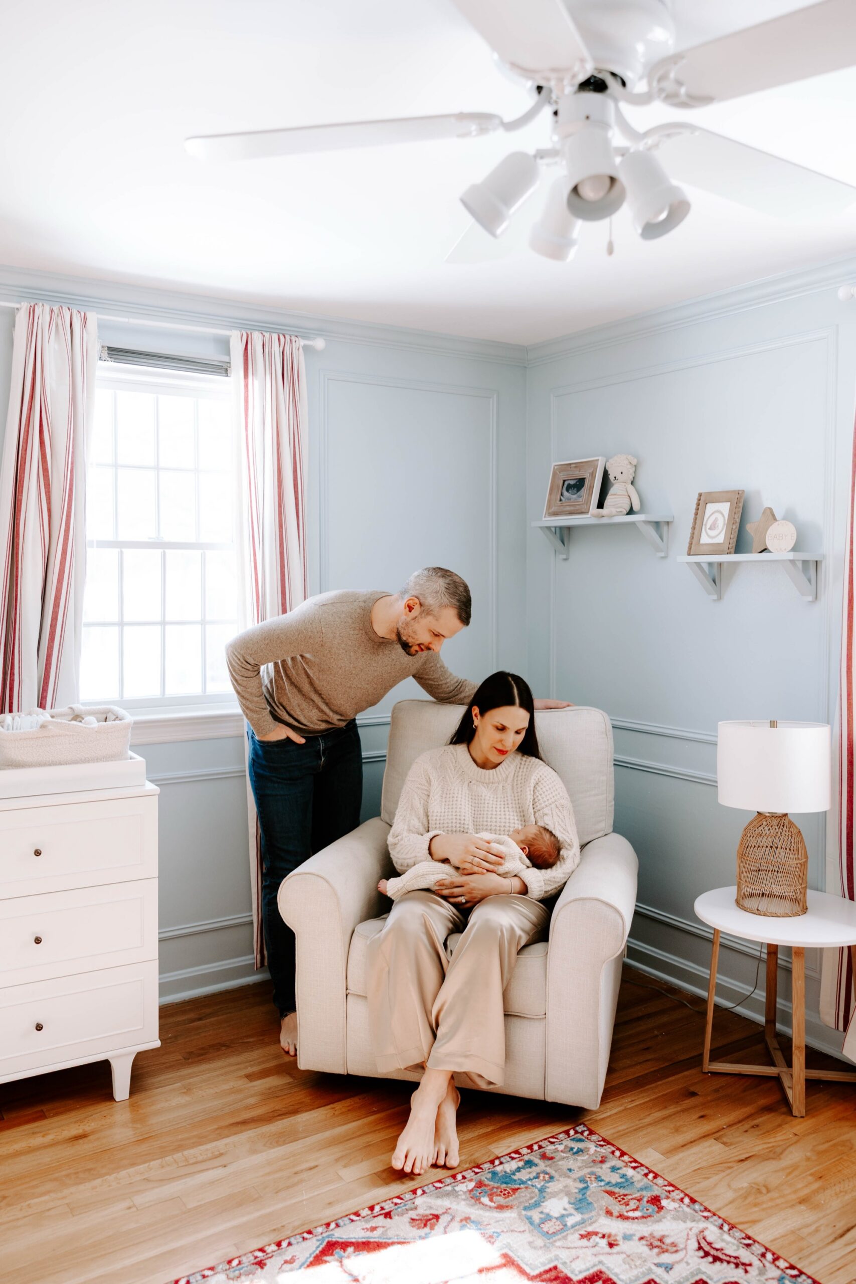 baby boy neutral nursery ideas; muted red, white, and blue nursery theme